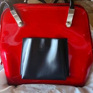 Red pattern leather bag.Beijo brand